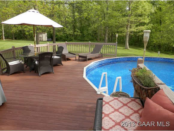 2198 Lyndhurst Road Waynesboro, VA 22980 - Photo 2 of 27 a backyard of a house with barbeque oven table and chairs