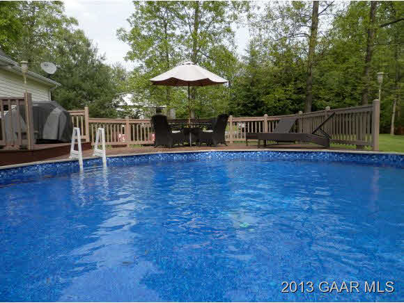 2198 Lyndhurst Road Waynesboro, VA 22980 - Photo 21 of 27 a view of a chairs and table under an umbrella