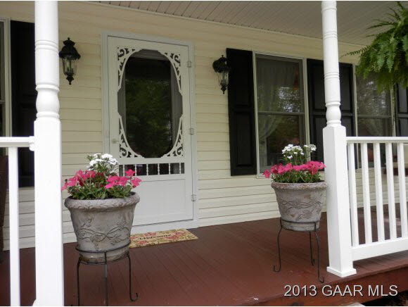 2198 Lyndhurst Road Waynesboro, VA 22980 - Photo 9 of 27 a front view of a house with outdoor seating