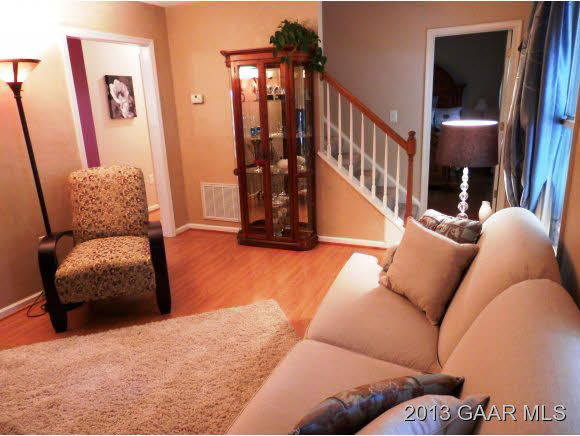 2198 Lyndhurst Road Waynesboro, VA 22980 - Photo 10 of 27 a living room with furniture and stairs