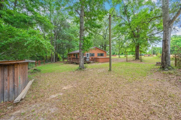 a house with trees in front of it