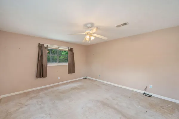 an empty room with a window