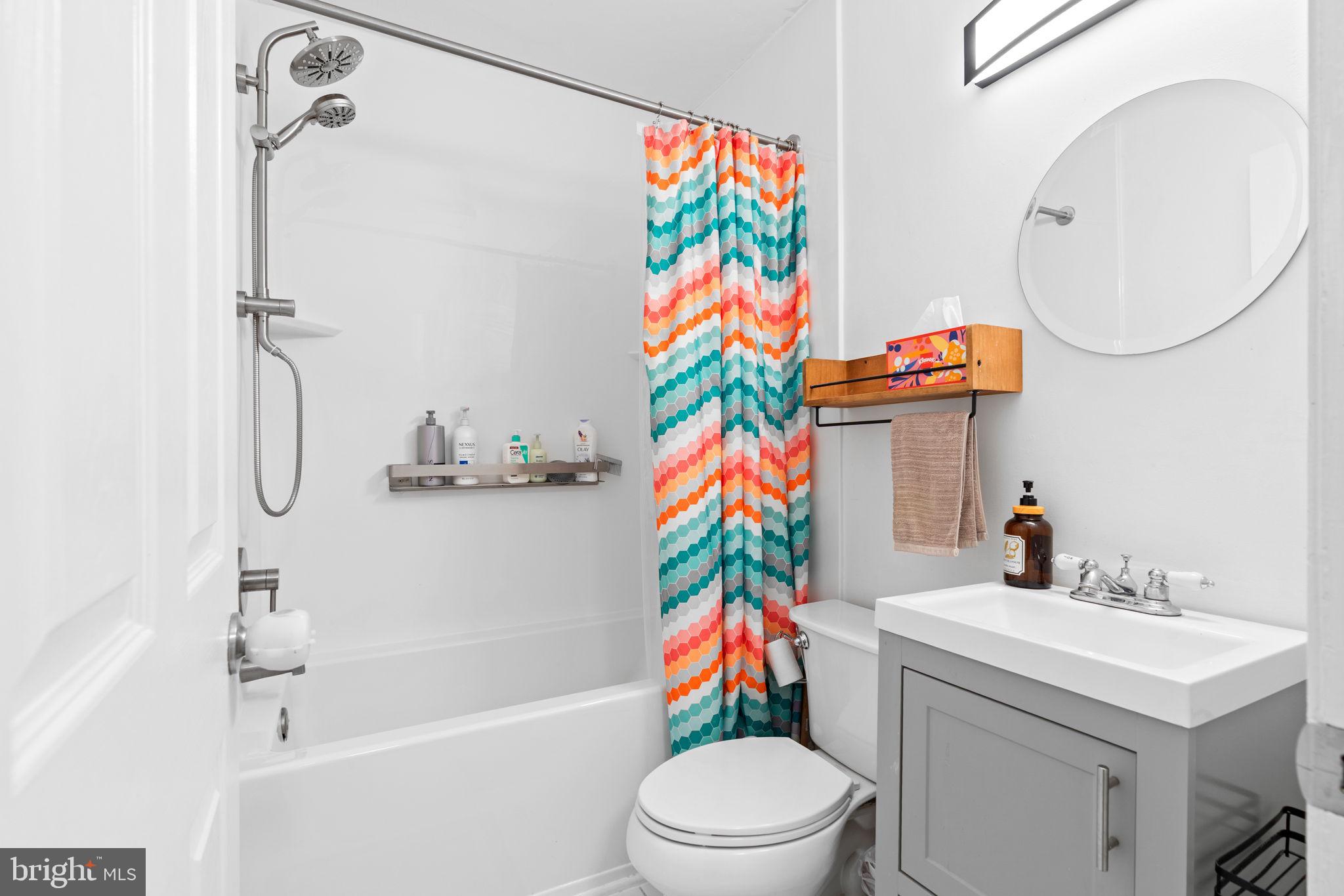 10310 Brunswick Avenue Silver Spring, MD 20902 - Photo 24 of 43 Vibrant bathroom with modern flair.