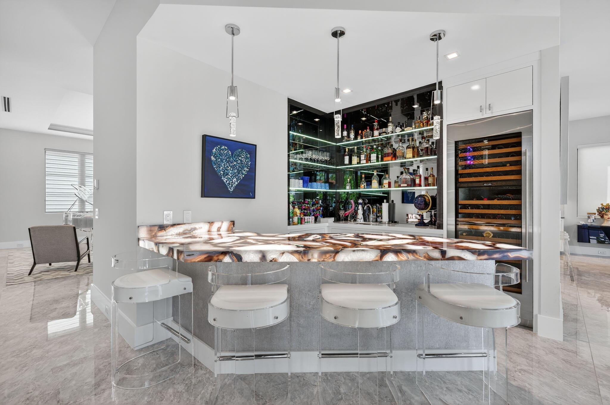 785 Northeast 70th Street Boca Raton, FL 33487 - Photo 13 of 80 a view of kitchen island with stainless steel appliances granite countertop a stove and a sink