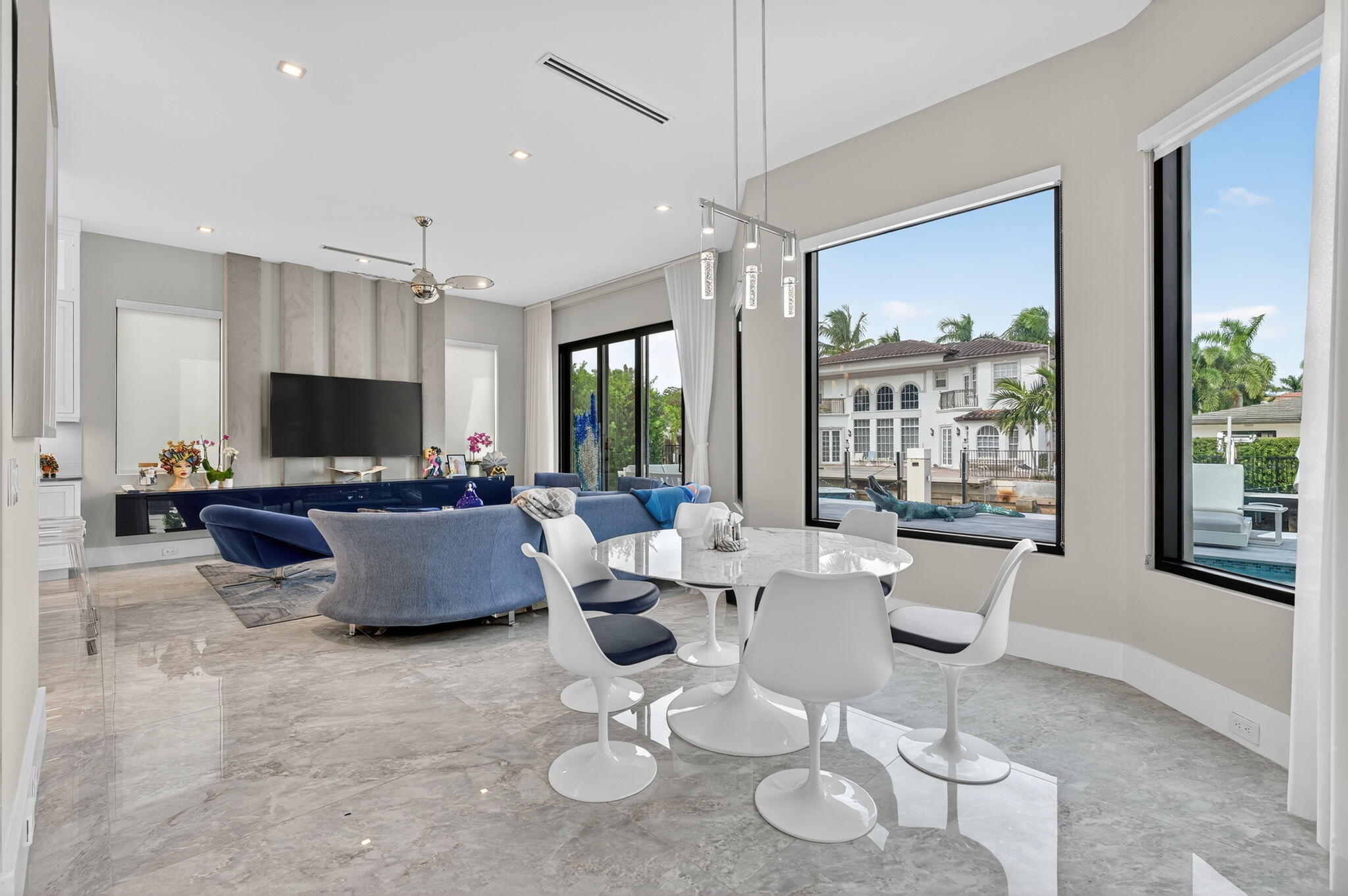 785 Northeast 70th Street Boca Raton, FL 33487 - Photo 16 of 80 a living room with furniture and a flat screen tv