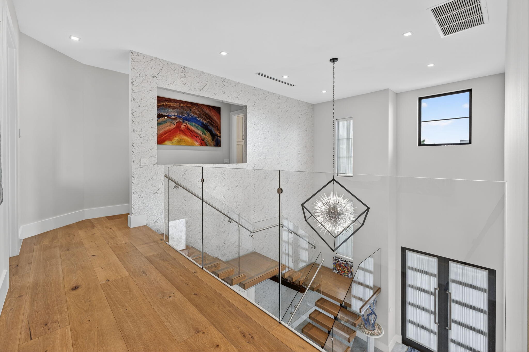 785 Northeast 70th Street Boca Raton, FL 33487 - Photo 45 of 80 a view of a hallway with wooden floor and entryway