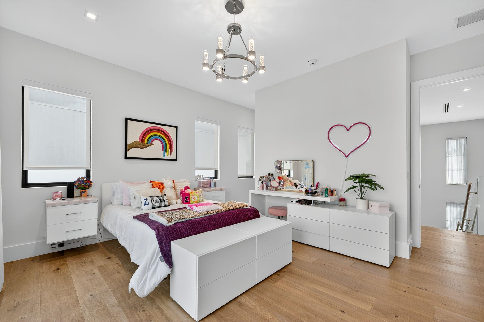 785 Northeast 70th Street Boca Raton, FL 33487 - Photo 57 of 80 a living room with furniture and a chandelier