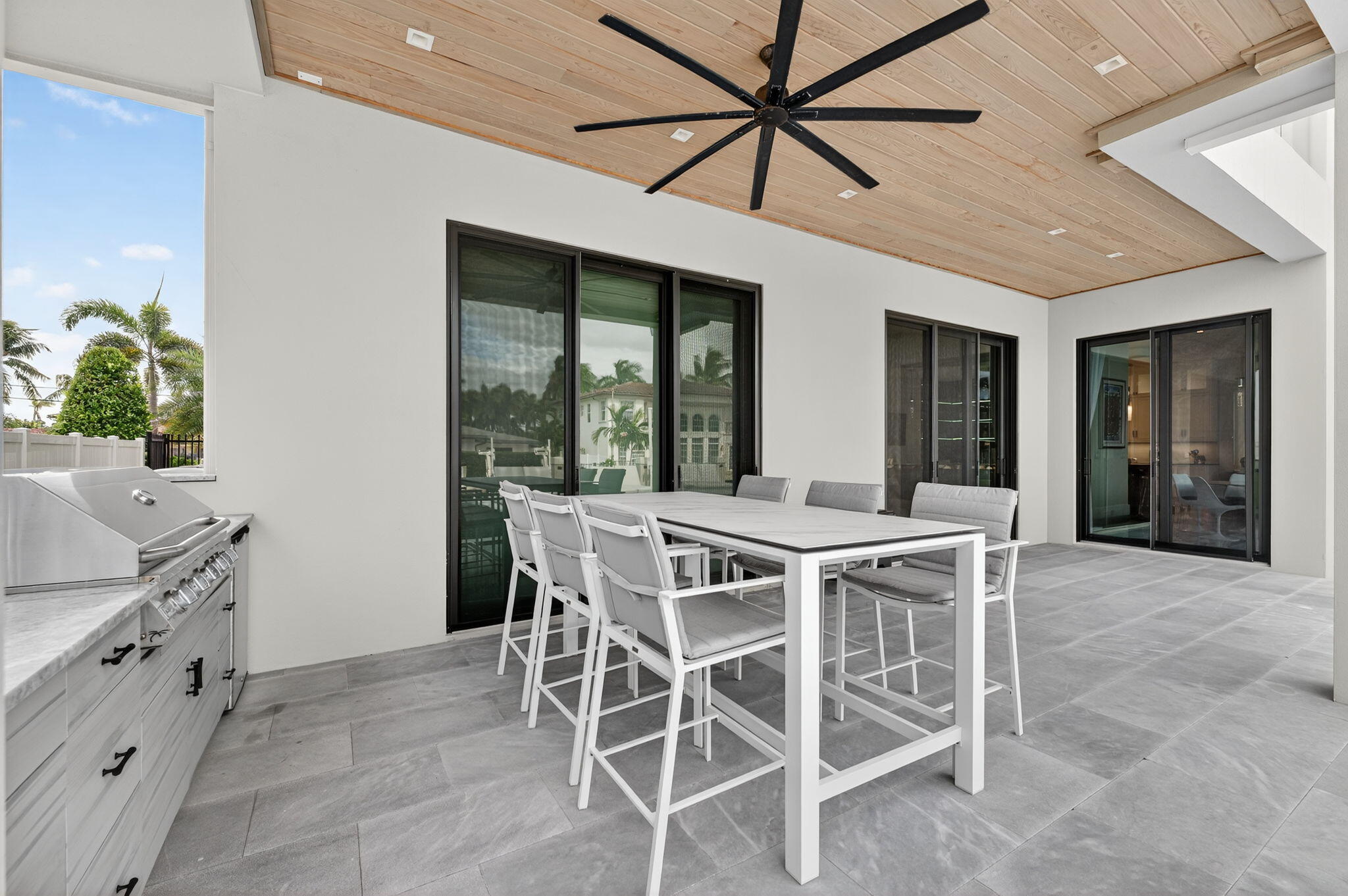 785 Northeast 70th Street Boca Raton, FL 33487 - Photo 62 of 80 a view of a dining room with furniture