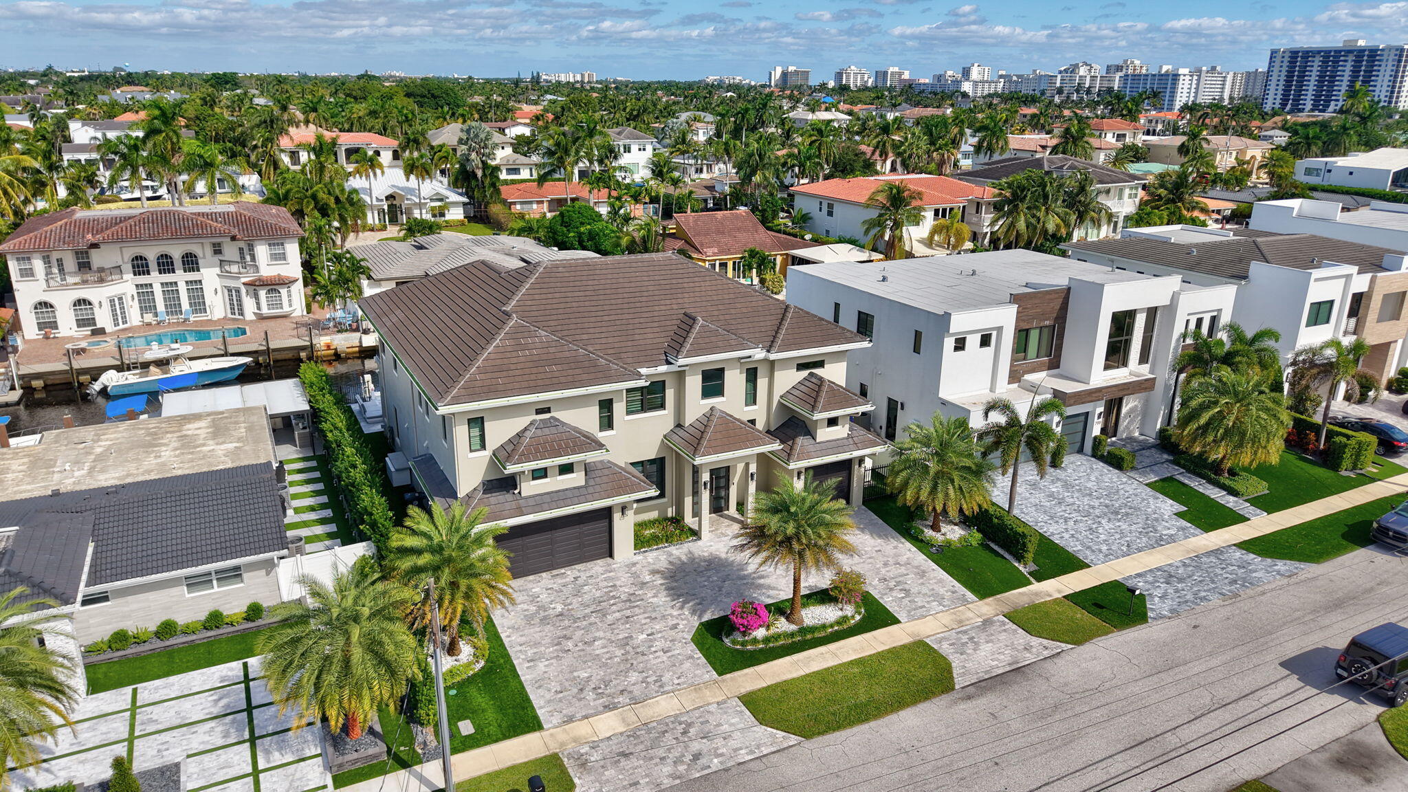 785 Northeast 70th Street Boca Raton, FL 33487 - Photo 71 of 80 an aerial view of multiple houses with a yard