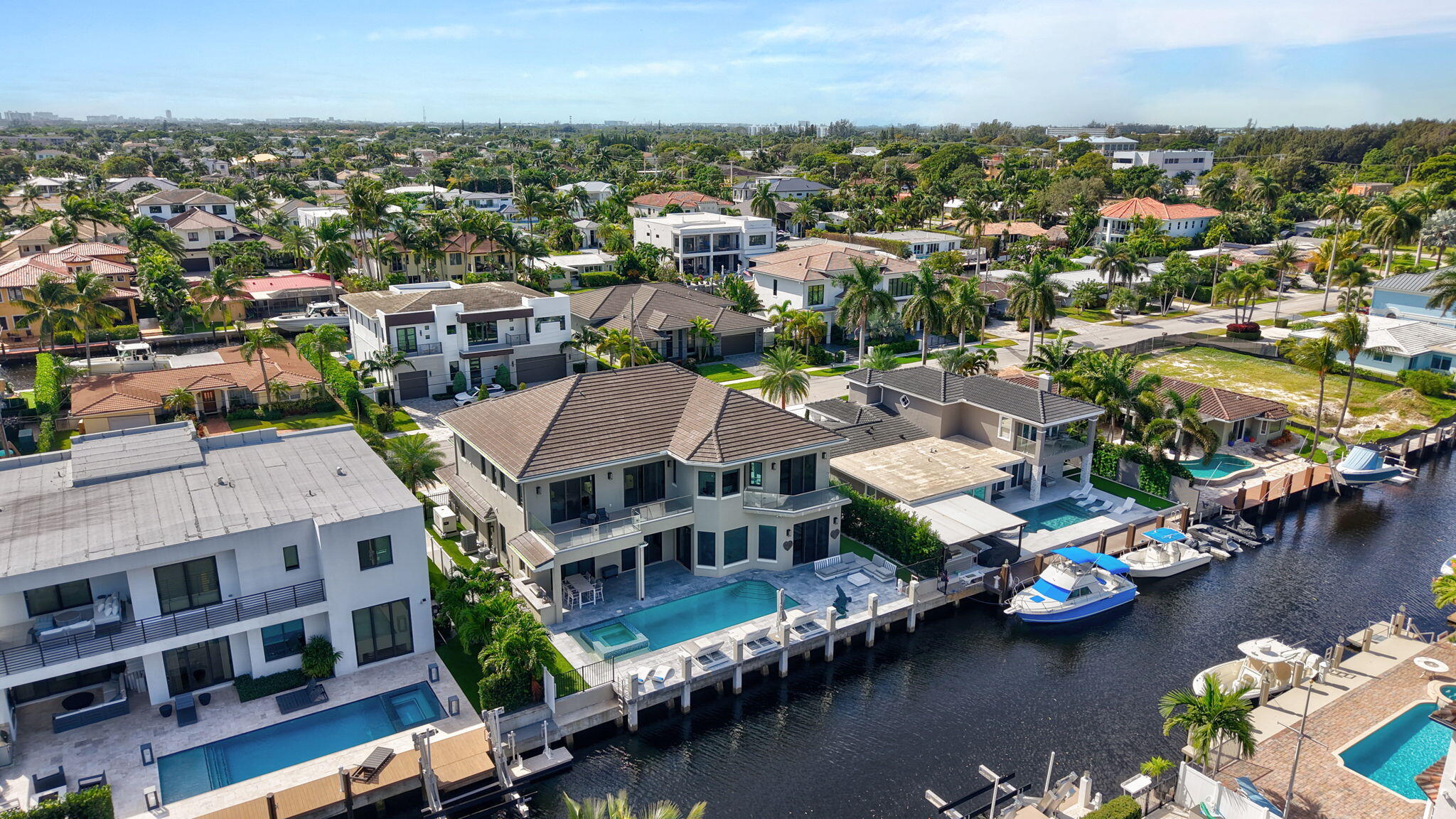 785 Northeast 70th Street Boca Raton, FL 33487 - Photo 76 of 80 an aerial view of a house with a lake view