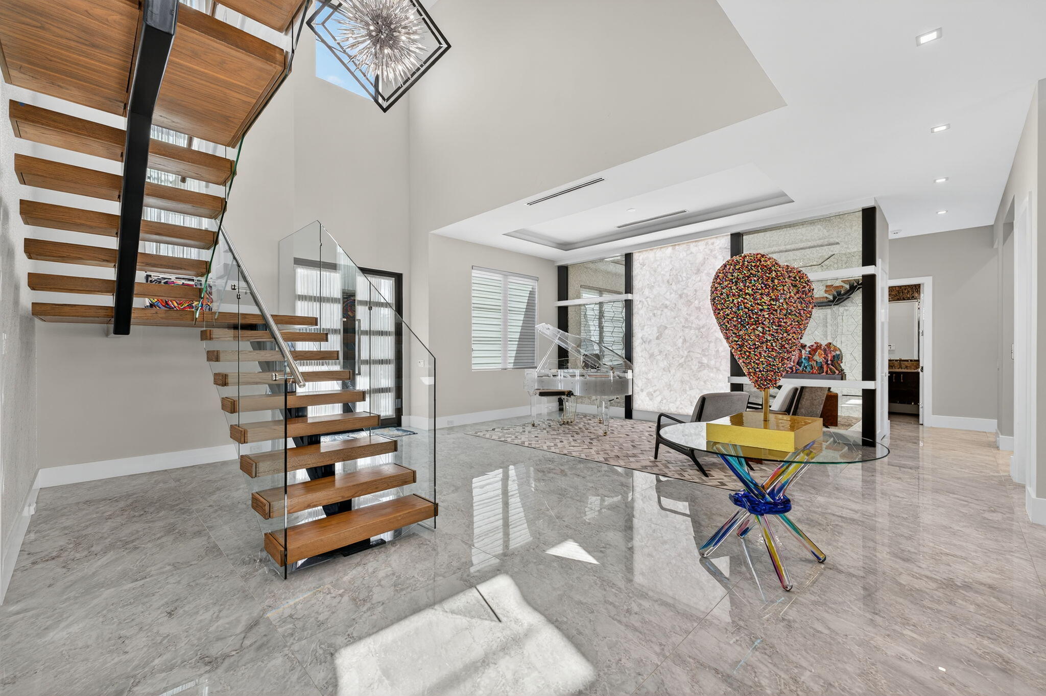 785 Northeast 70th Street Boca Raton, FL 33487 - Photo 10 of 80 a living room with furniture and a table