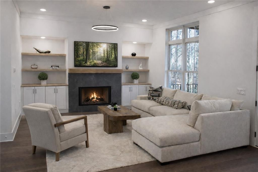531 South Main Street, Unit 320 Alpharetta, GA 30009 - Photo 18 of 43 a living room with furniture and a fireplace