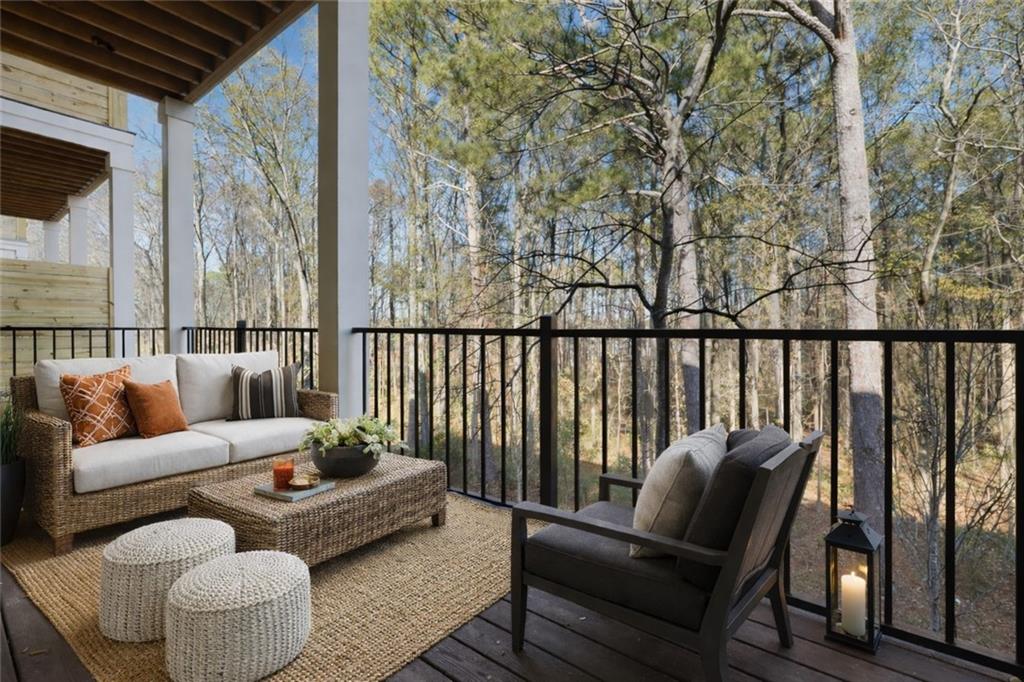 531 South Main Street, Unit 320 Alpharetta, GA 30009 - Photo 20 of 43 a roof deck with couches and wooden floor