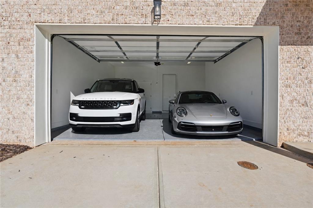 531 South Main Street, Unit 320 Alpharetta, GA 30009 - Photo 21 of 43 a car parked in garage