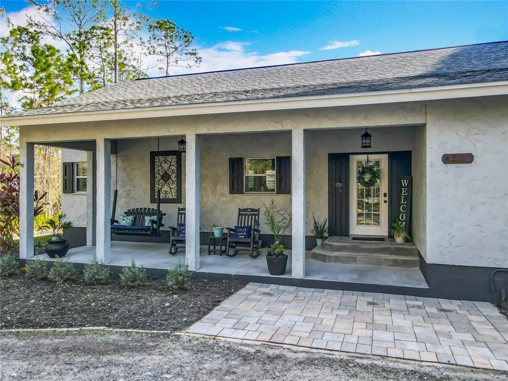 4252 Quail Ranch Road New Smyrna Beach, FL 32168 - Photo 31 of 77 front porch