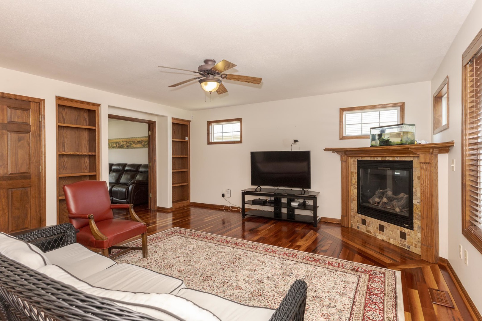 3250 Topaz Road Normal, IL 61761 - Photo 16 of 54 a living room with furniture and a flat screen tv