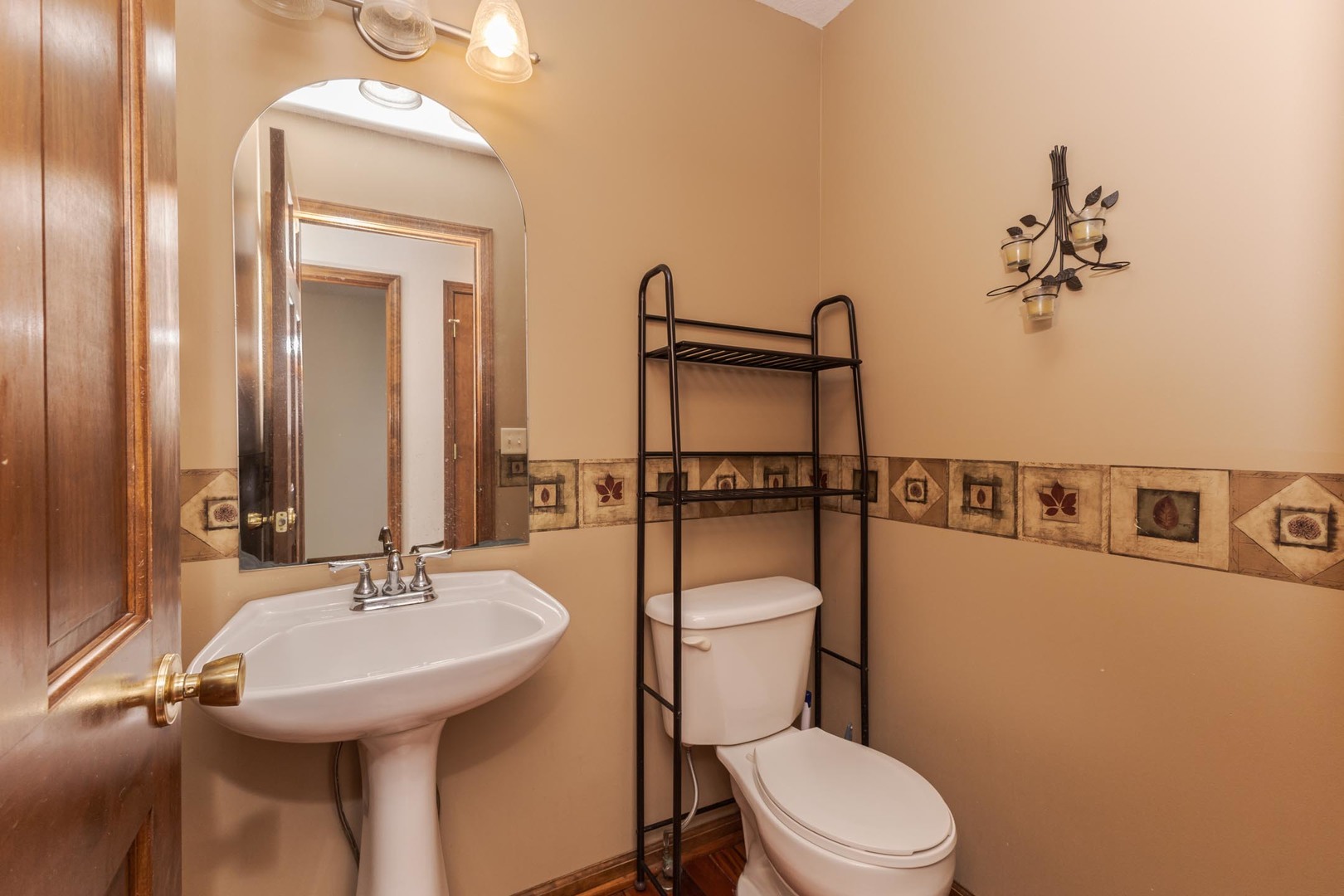 3250 Topaz Road Normal, IL 61761 - Photo 24 of 54 a bathroom with a toilet sink and mirror