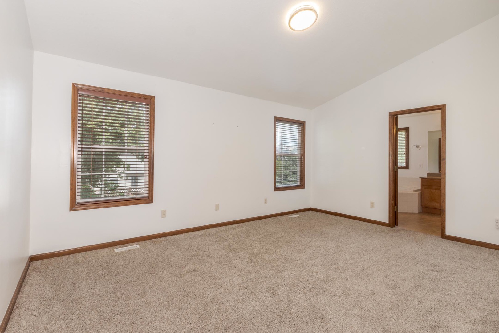 3250 Topaz Road Normal, IL 61761 - Photo 25 of 54 an empty room with windows