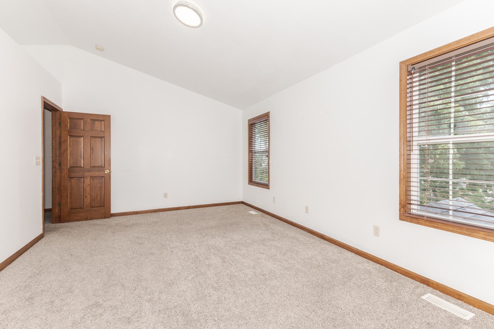 3250 Topaz Road Normal, IL 61761 - Photo 27 of 54 an empty room with windows