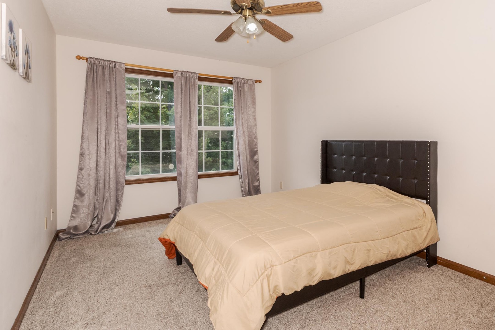 3250 Topaz Road Normal, IL 61761 - Photo 30 of 54 a bedroom with a bed and window