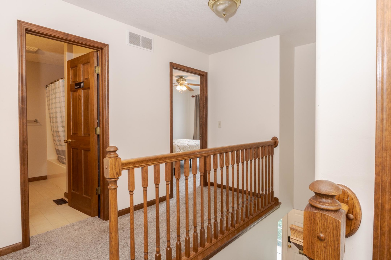 3250 Topaz Road Normal, IL 61761 - Photo 34 of 54 a view of a hallway with wooden floor