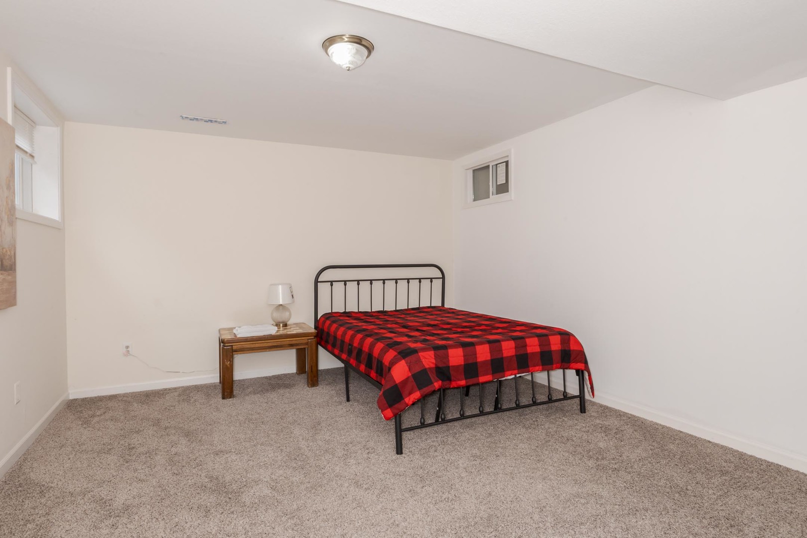 3250 Topaz Road Normal, IL 61761 - Photo 44 of 54 a room with a bed and a table in it