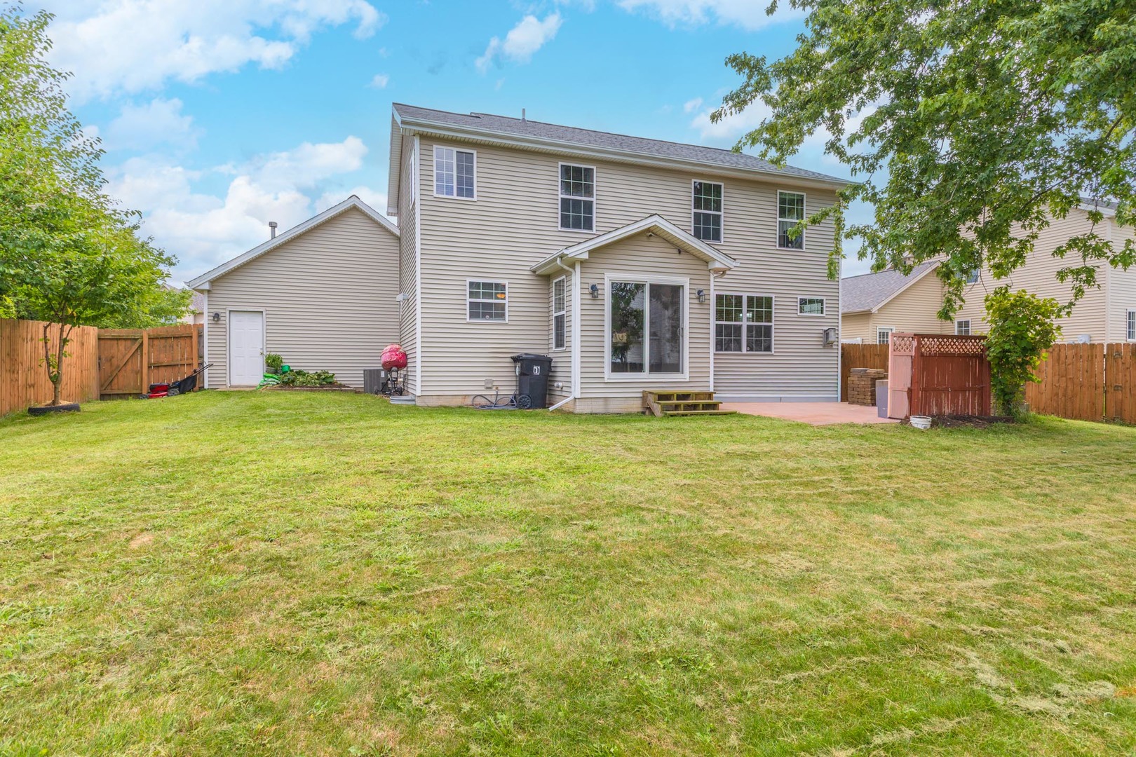 3250 Topaz Road Normal, IL 61761 - Photo 50 of 54 a view of a house with a yard