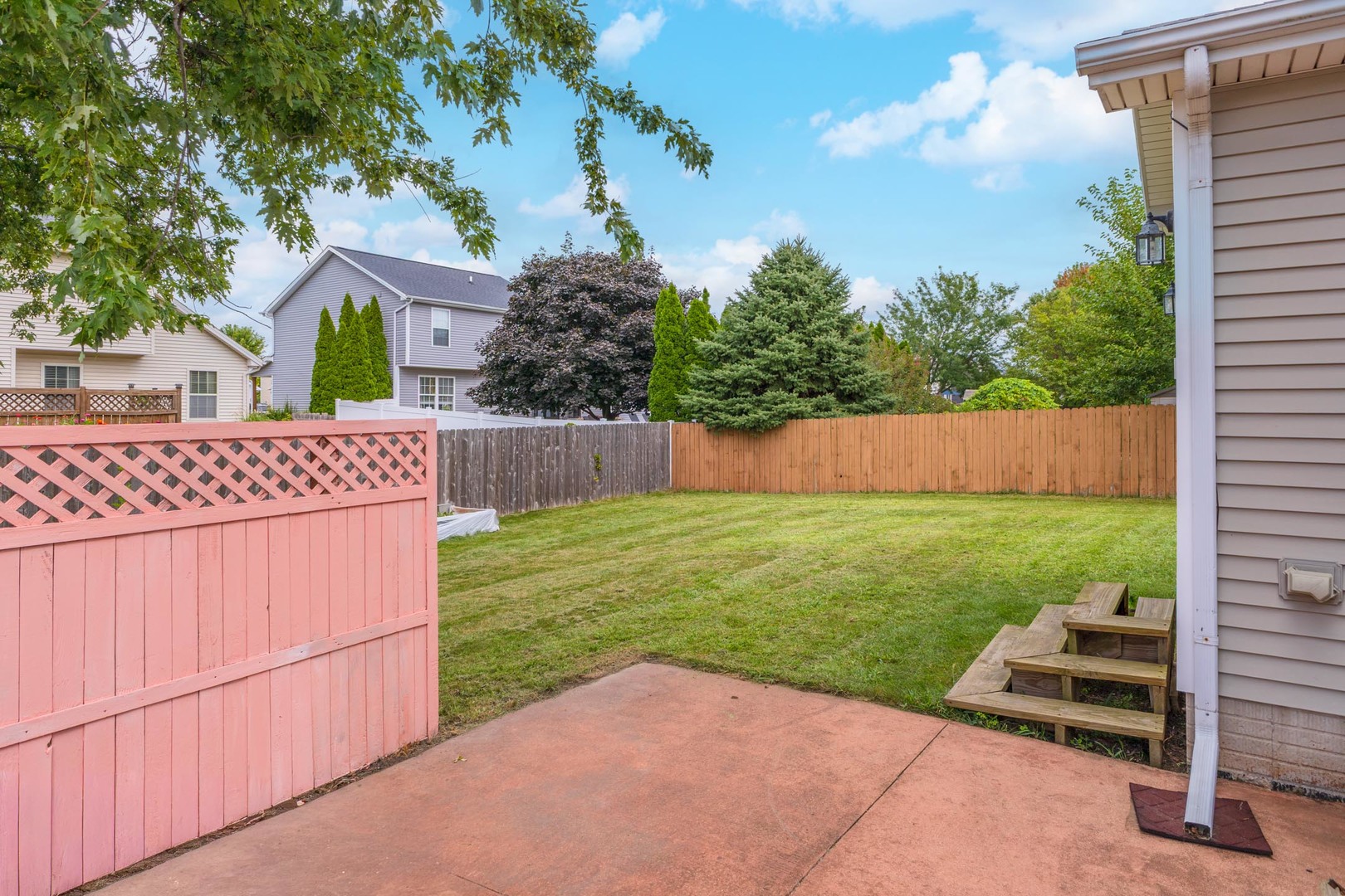3250 Topaz Road Normal, IL 61761 - Photo 52 of 54 a view of backyard with outdoor seating and green space