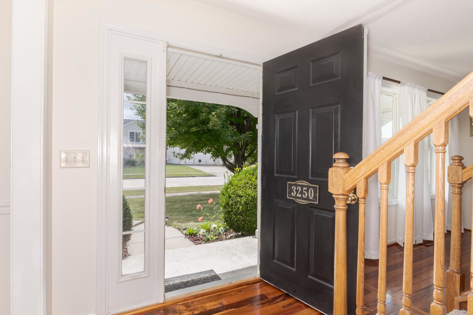 3250 Topaz Road Normal, IL 61761 - Photo 10 of 54 a view of a door and wooden floor