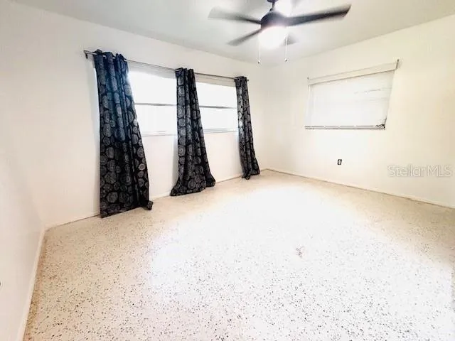 an empty room with windows