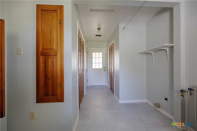 a bathroom with a sink and shower