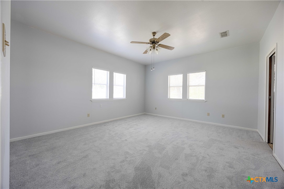 3814 Maeker Road Flatonia, TX 78941 - Photo 15 of 28 a view of an empty room with a window