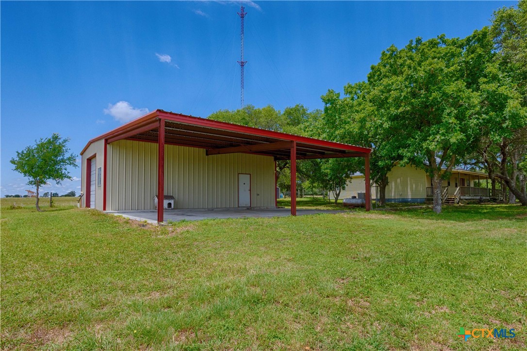 3814 Maeker Road Flatonia, TX 78941 - Photo 2 of 28 a view of a house with a yard