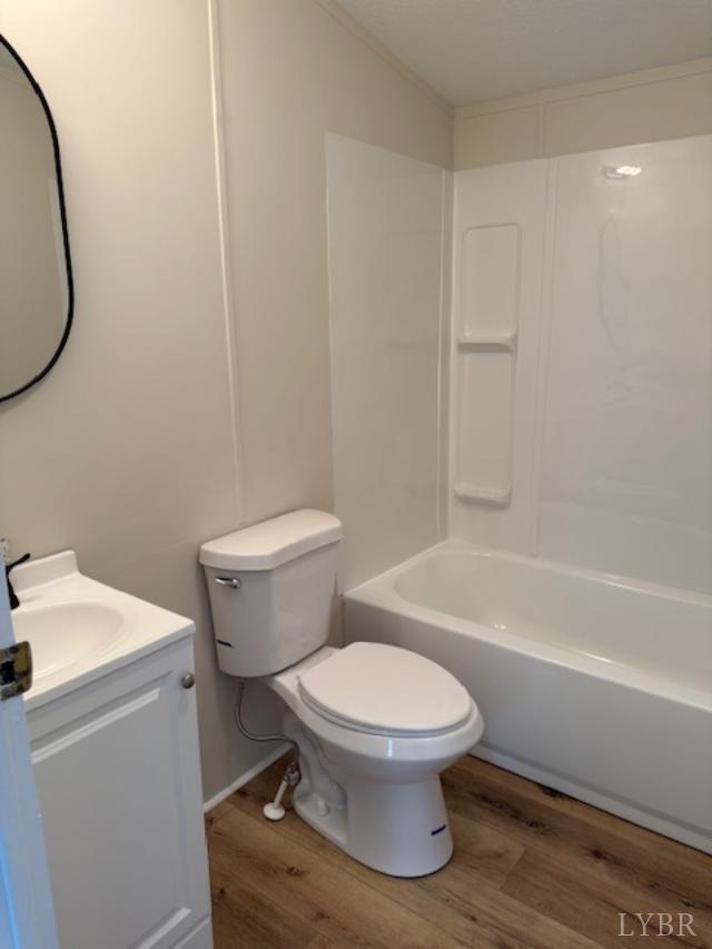 3112 Red House Road Appomattox, VA 24522 - Photo 13 of 14 a white toilet sitting next to a bath tub