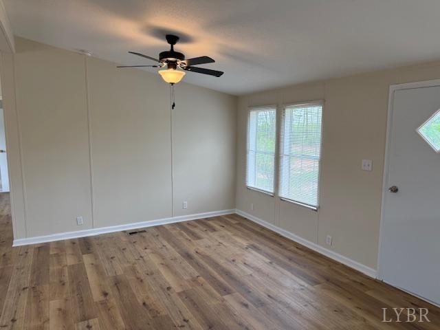 3112 Red House Road Appomattox, VA 24522 - Photo 4 of 14 a view of empty room with wooden floor