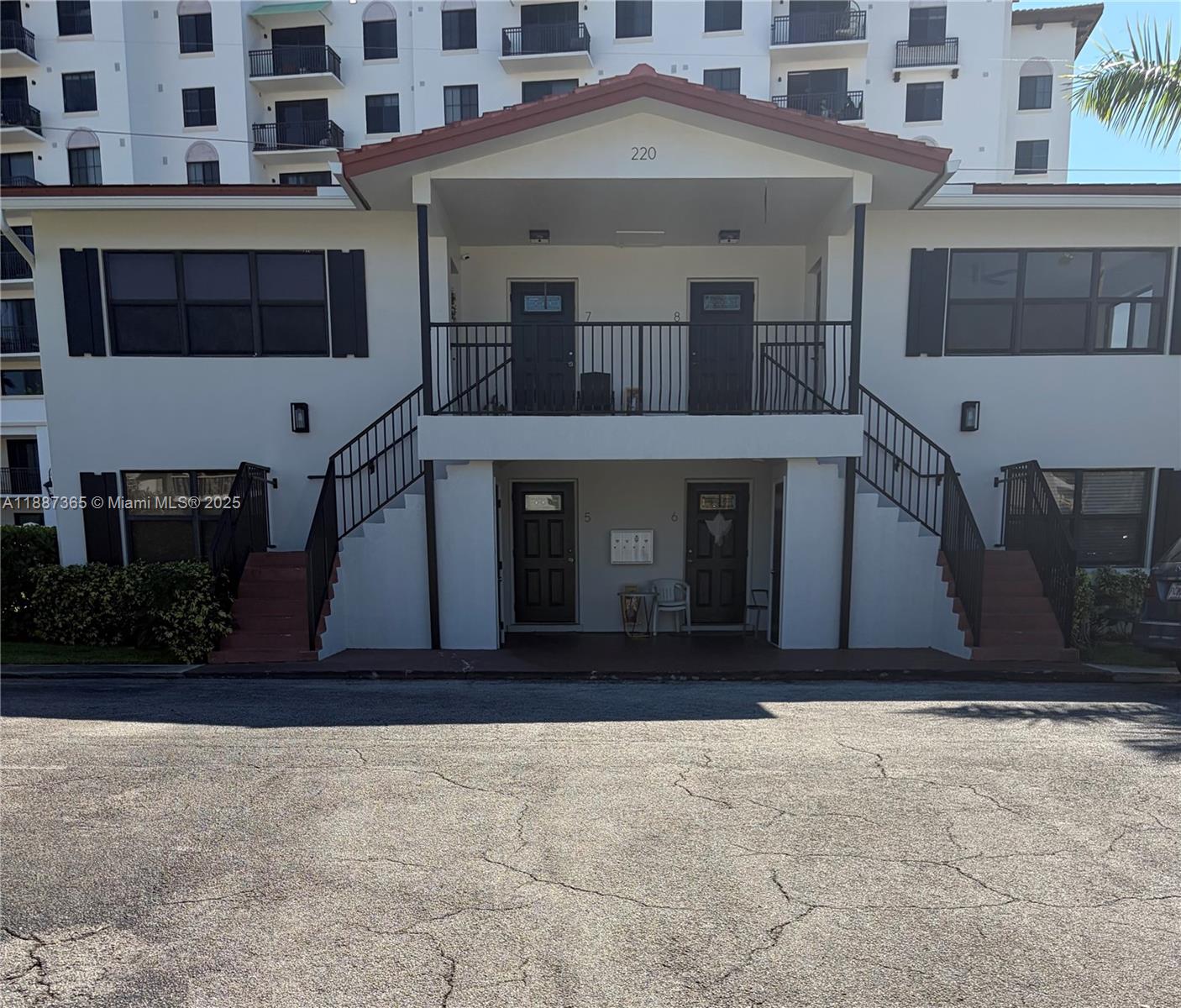 220 Southwest 7th Street, Unit 8 Boca Raton, FL 33432 - Photo 1 of 14 a front view of a building