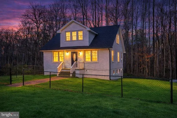 a view of a house with a park