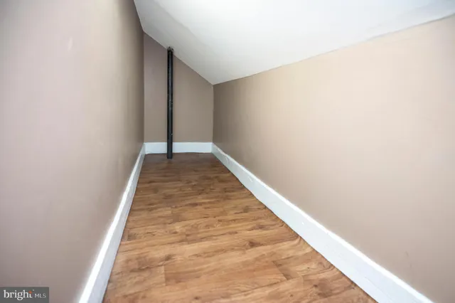 a view of a livingroom with furniture and a garage