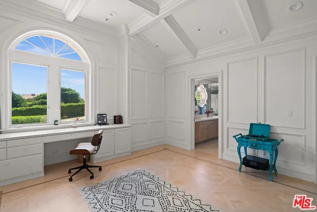 a living room with a rug