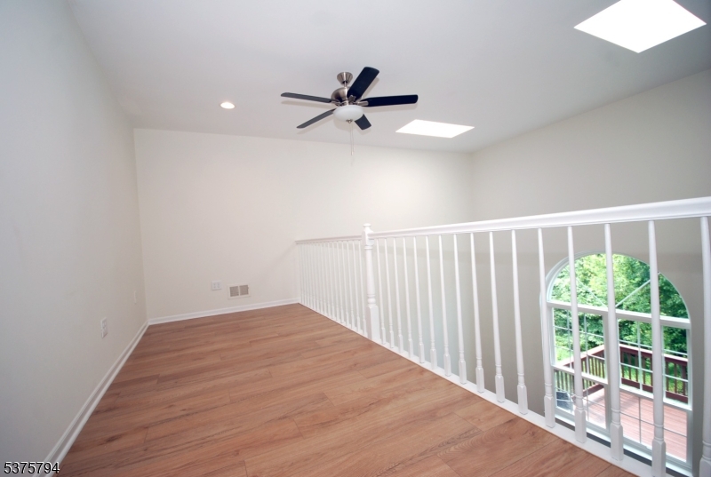 23 Buffalo Hollow Road Somerville, NJ 08876 - Photo 7 of 12 en empty room with windows