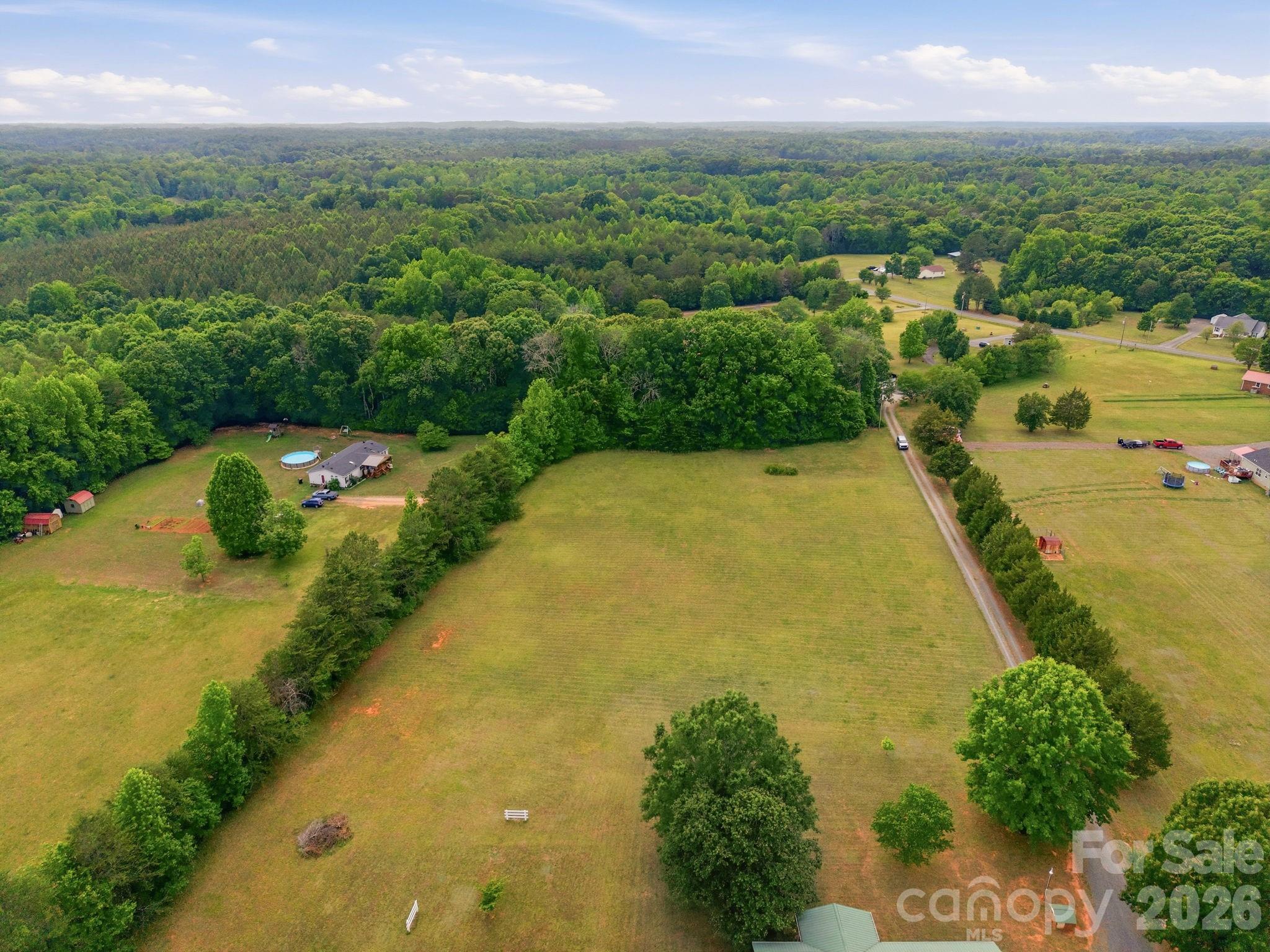 Tbd Sisk-Carter Road Rockwell, NC 28138 - Photo 6 of 14 a view of a lake with a city