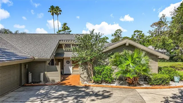 a large room with a couch and a view of living room
