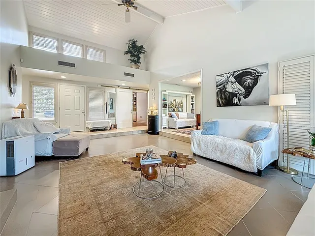 a kitchen with stainless steel appliances granite countertop a refrigerator sink and cabinets