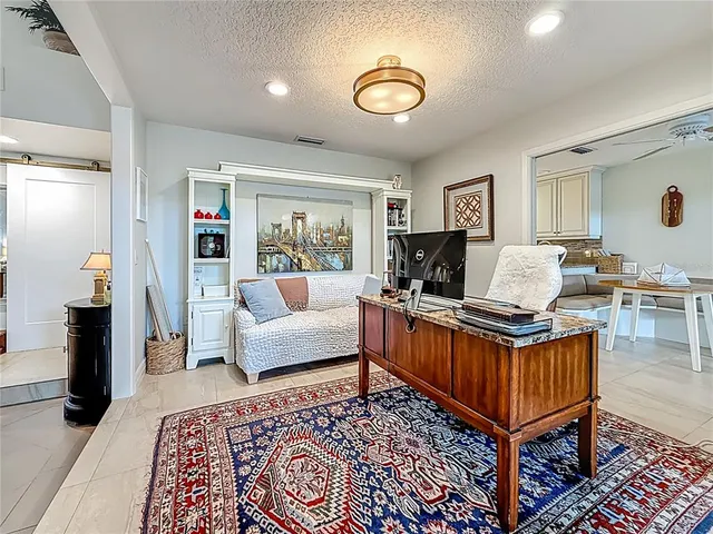 a kitchen with stainless steel appliances granite countertop a stove sink microwave and cabinets