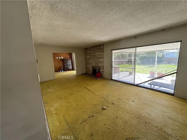 an empty room with sliding door