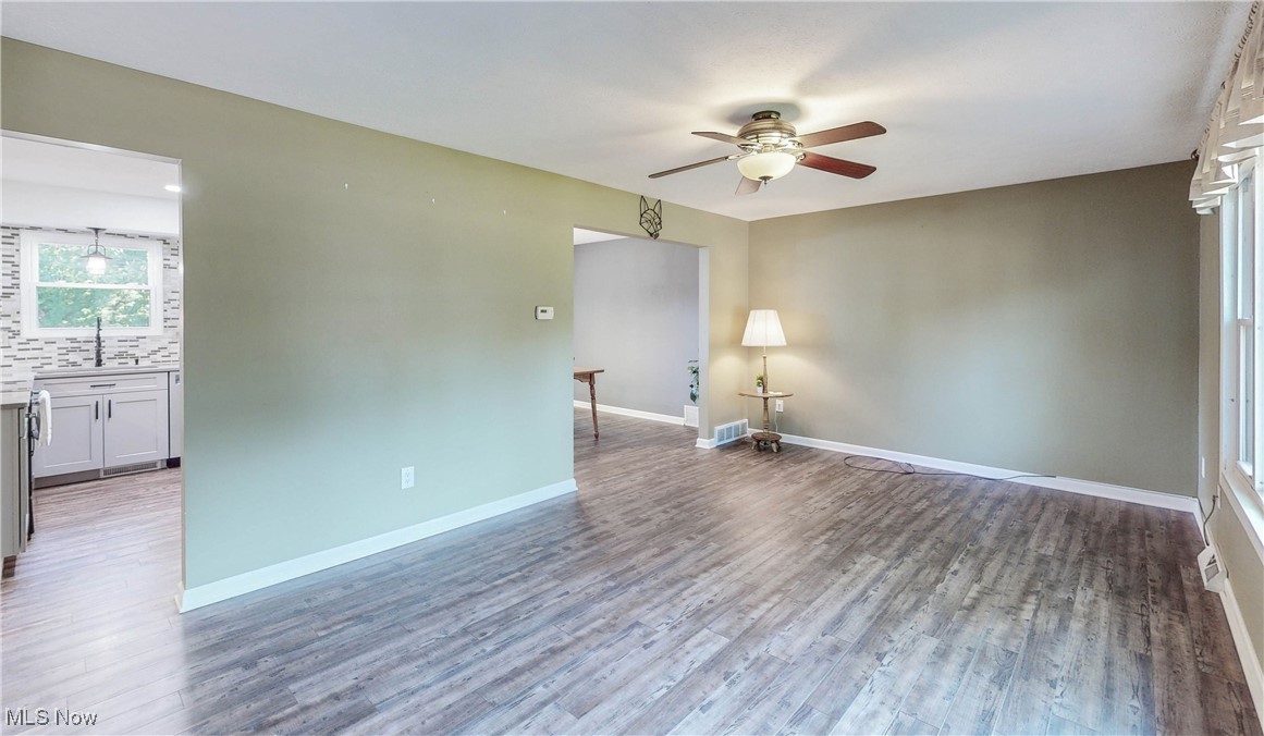 3491 Kent Road Stow, OH 44224 - Photo 6 of 40 Living room featuring ceiling fan, and waterproof LVT flooring