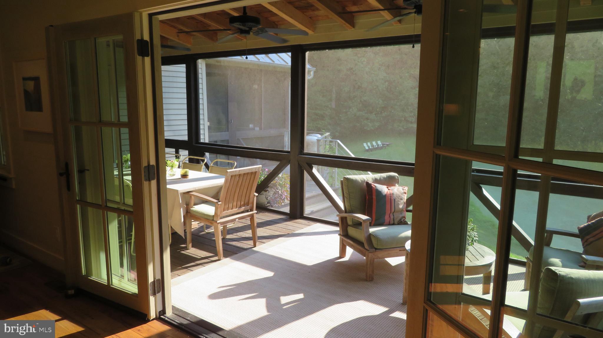 135 Sharp Rock Road Sperryville, VA 22740 - Photo 29 of 58 Large Screen Porch