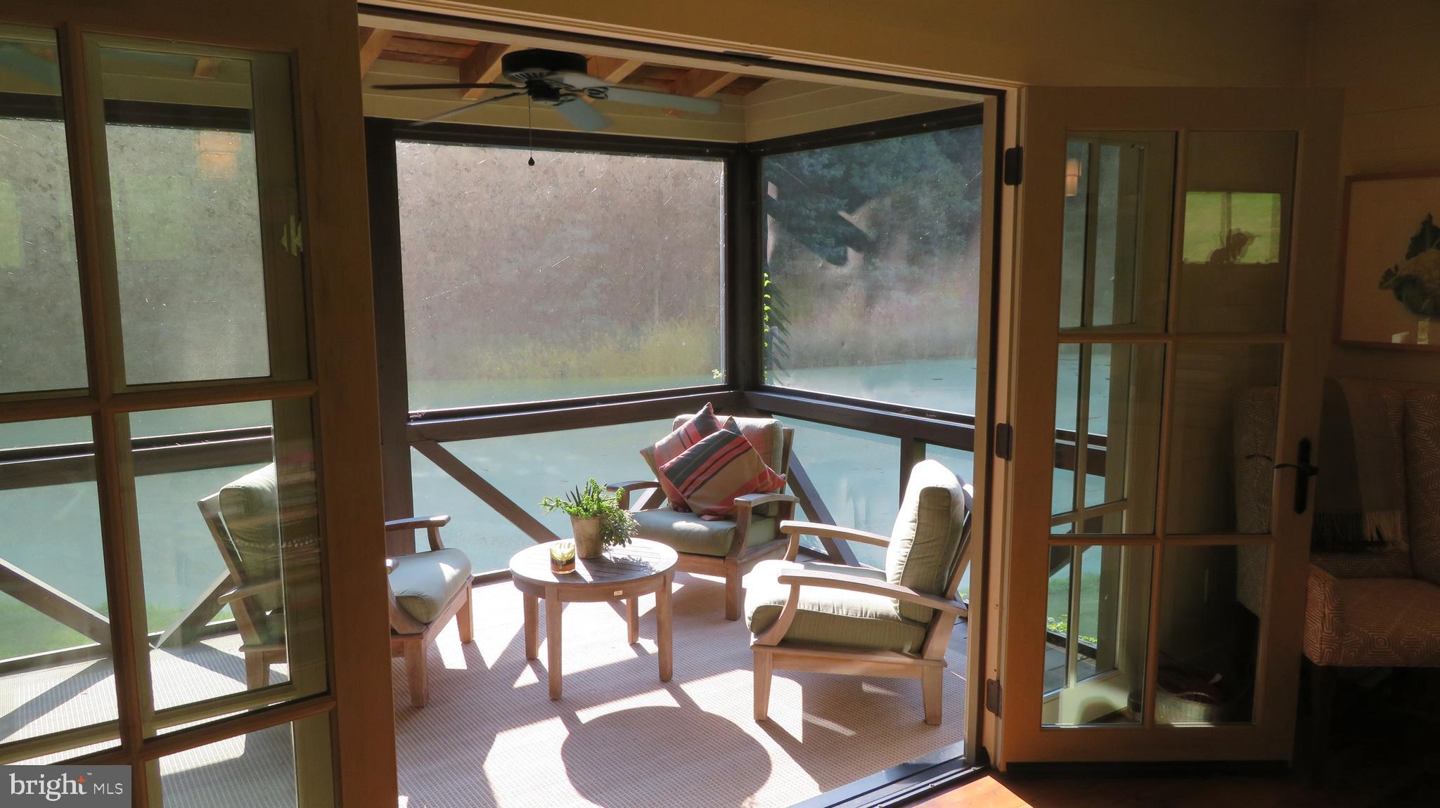 135 Sharp Rock Road Sperryville, VA 22740 - Photo 30 of 58 Large Screen Porch