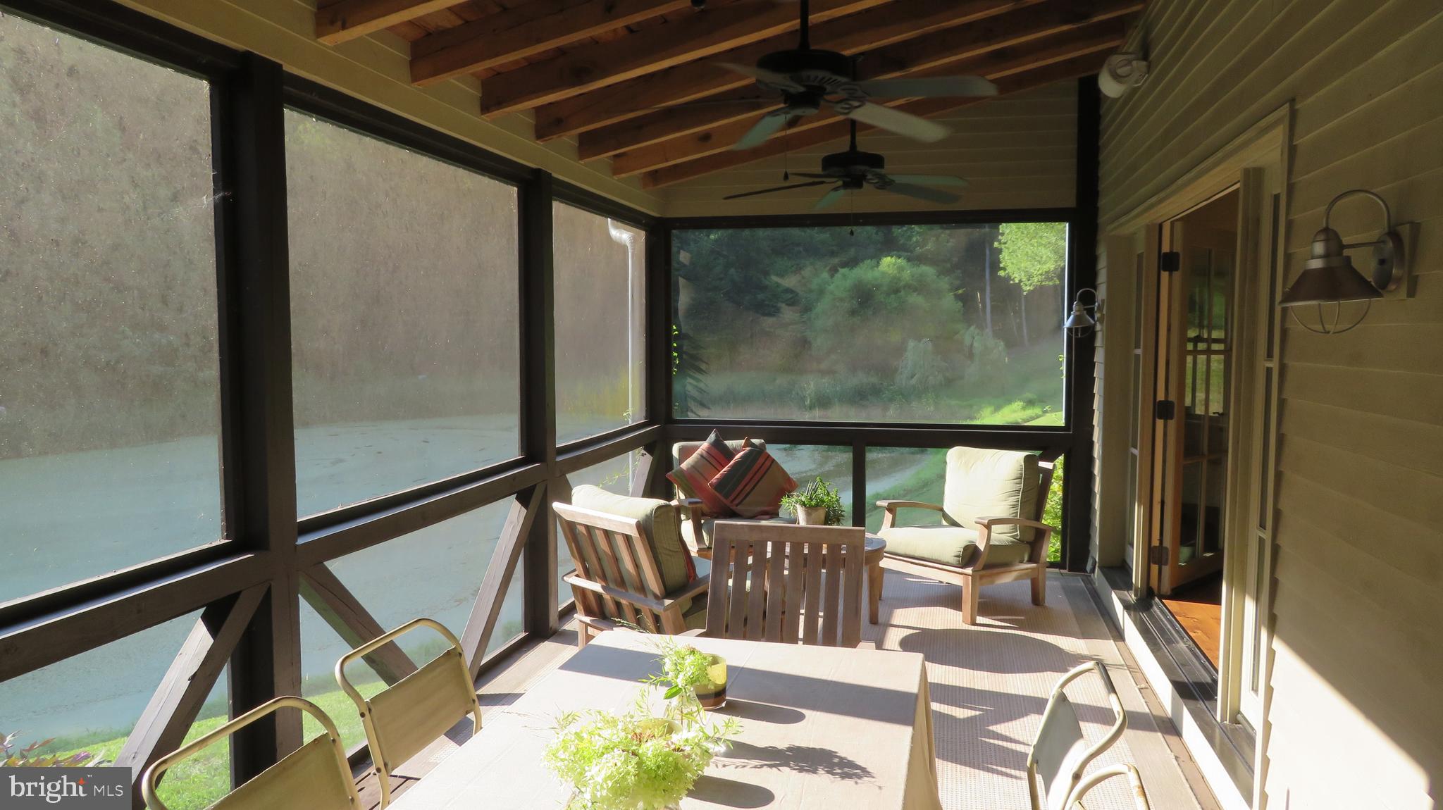 135 Sharp Rock Road Sperryville, VA 22740 - Photo 32 of 58 Large Screened Porch