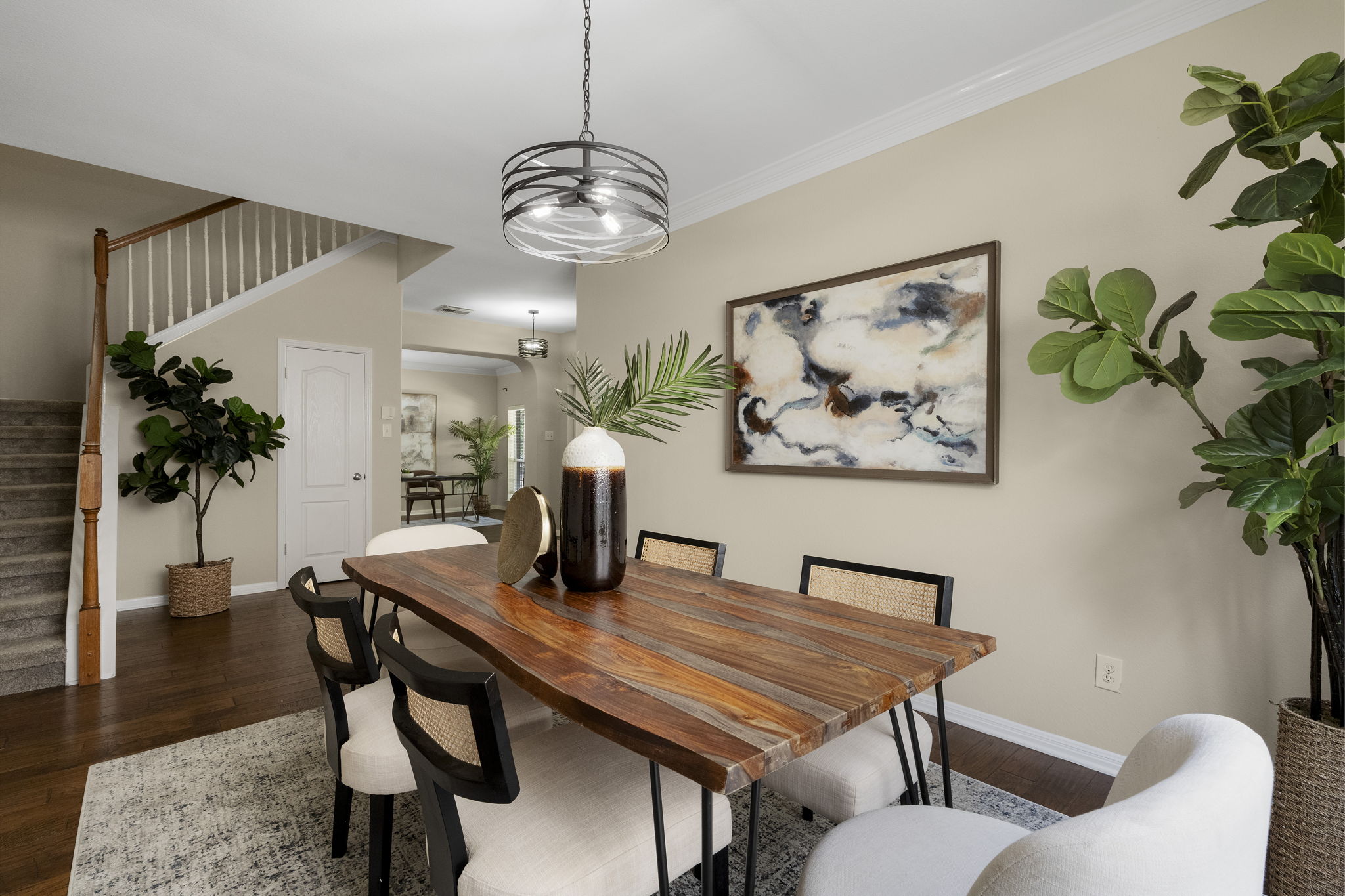 1822 Nelson Ranch Loop Cedar Park, TX 78613 - Photo 8 of 40 A contemporary light fixture creates an attractive focal point above the dining area.